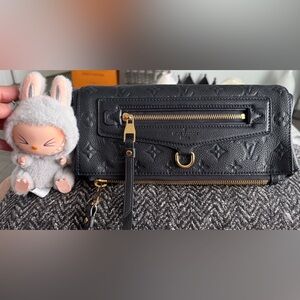 Louis Vuitton Navy Leather Clutch with Gold Accents